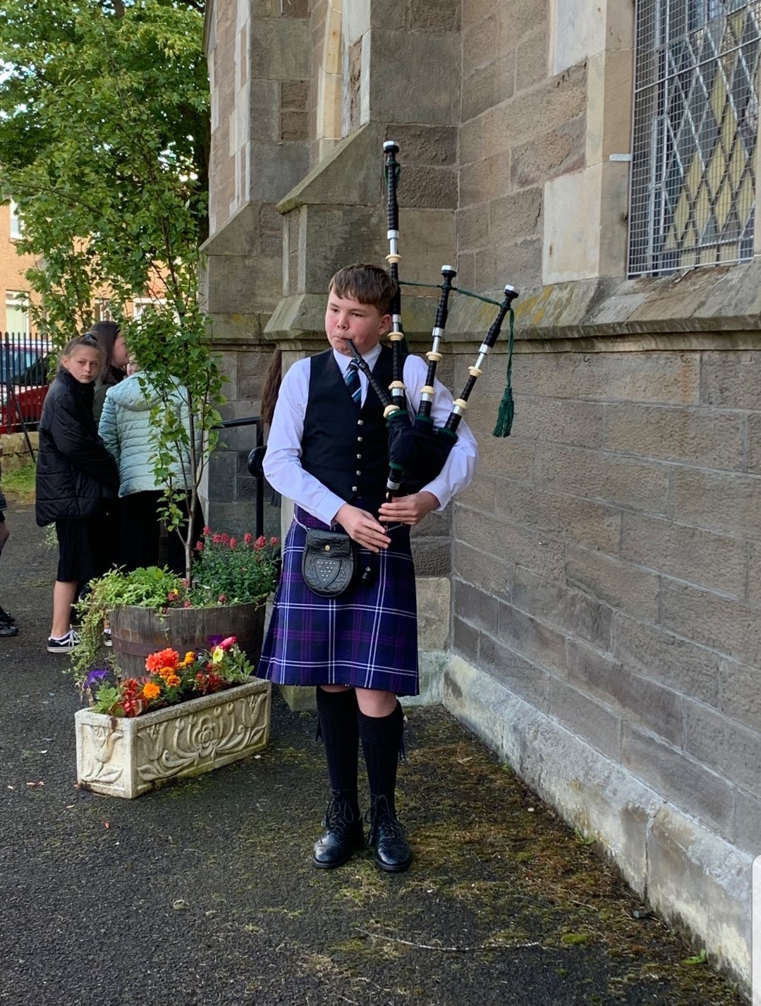 Piping in at Downfield Primary Prize giving